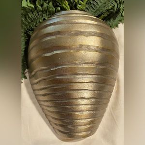 Gold-colored RIBBED WALL PLANTER by Home Interiors